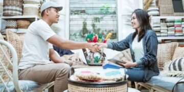 How does a social entrepreneur make business and impact?